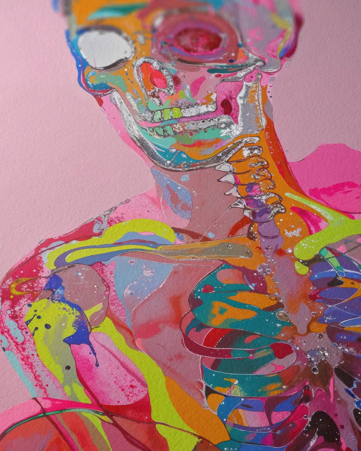 Vibrant fine art print featuring a colorful, abstract human skeleton on a pink background, blending vivid hues of orange, blue, green, and red to create a bold and modern representation of anatomy.